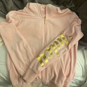 Light pink Juicy Couture velour zip up with gold writing on arm